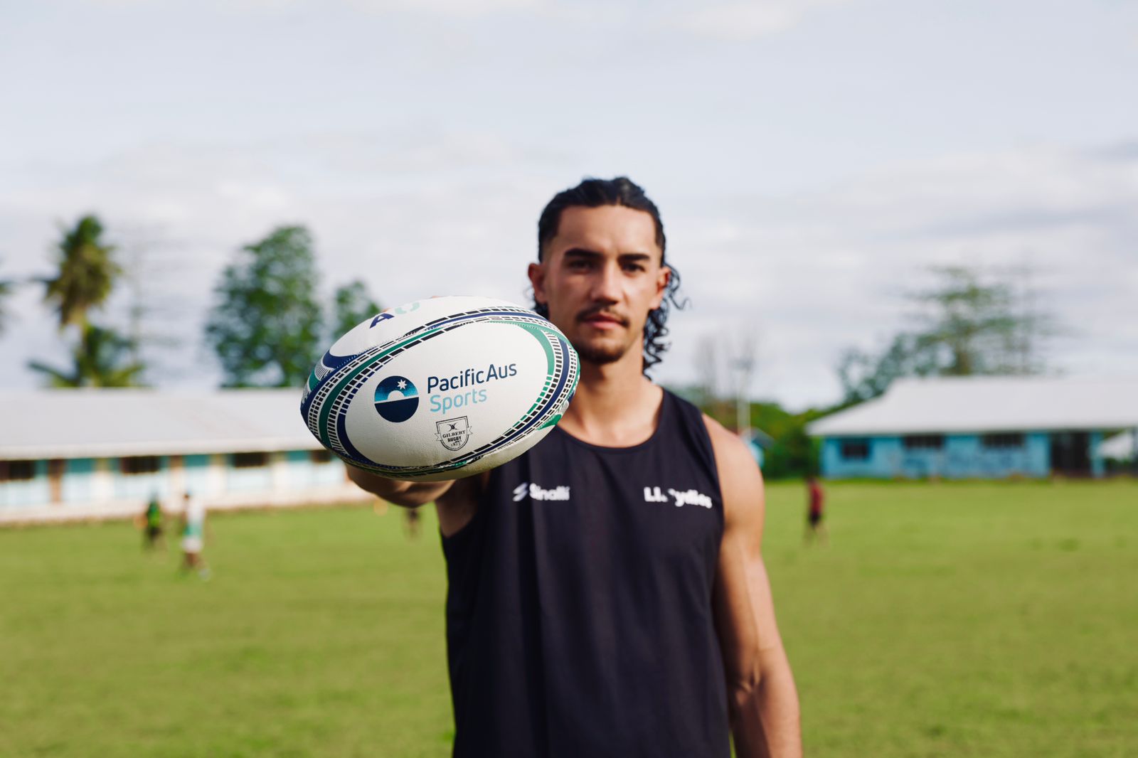 Rugby ball in hand